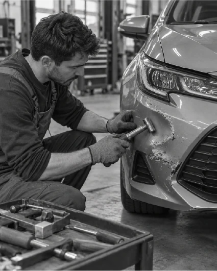 Dented car bumper and panel repair